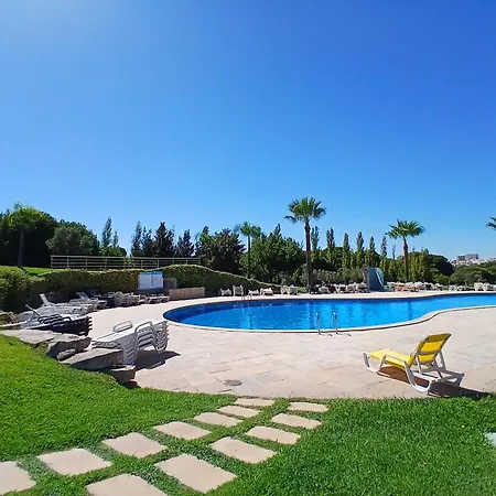 Апартаменты Sunny Duplex With Pool In By Lovelystay